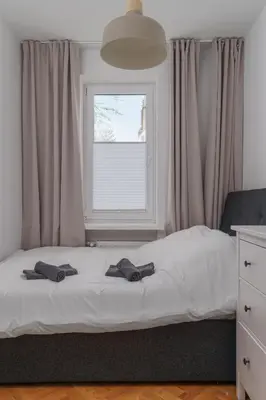 Łóżko lub łóżka w pokoju w obiekcie Wandy 3-7 - Better Rental