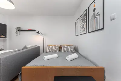 Łóżko lub łóżka w pokoju w obiekcie Szaserów 47-49 by Homeprime