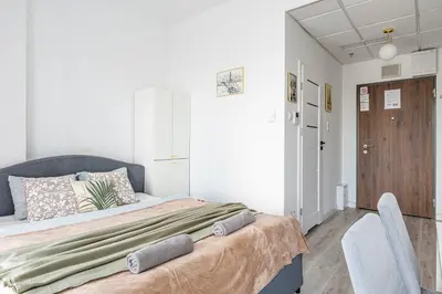 Łóżko lub łóżka w pokoju w obiekcie Kasprzaka Apt 749 SuperApart - Near EXPO and PKP Zachodnia