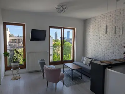 Telewizja i/lub zestaw kina domowego w obiekcie BNN Apartment by EXPO XXI