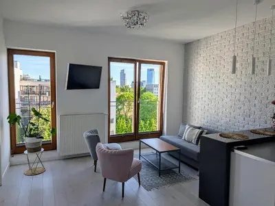 Telewizja i/lub zestaw kina domowego w obiekcie BNN Apartment by EXPO XXI