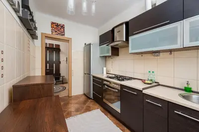 Kuchnia lub aneks kuchenny w obiekcie Rondo Wiatraczna Stylish Apartment by BookingHost