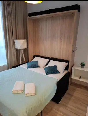 Łóżko lub łóżka w pokoju w obiekcie Zlatarooms 409