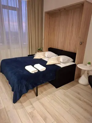 Łóżko lub łóżka w pokoju w obiekcie Zlatarooms 226