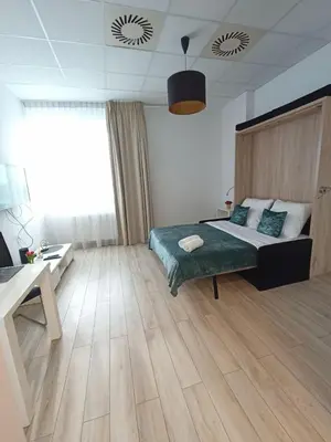 Łóżko lub łóżka w pokoju w obiekcie Zlatarooms 222