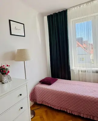 Łóżko lub łóżka w pokoju w obiekcie Moon River apartment in Warsaw premium location close to metro