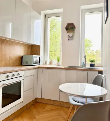 Kuchnia lub aneks kuchenny w obiekcie Moon River apartment in Warsaw premium location close to metro