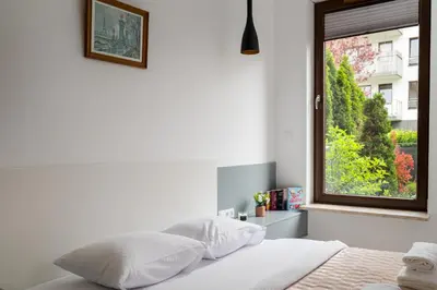 Łóżko lub łóżka w pokoju w obiekcie Royal Wilanów Boutique Apartment by BookingHost