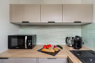 Kuchnia lub aneks kuchenny w obiekcie P&O Apartments- Cozy Studio Apartment in The City Centre