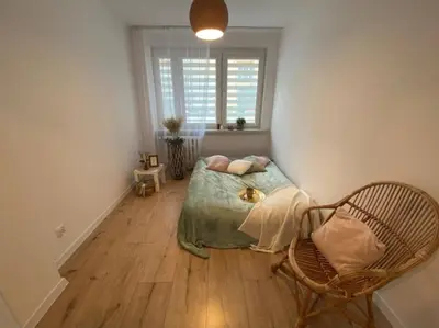 Łóżko lub łóżka w pokoju w obiekcie Apartament na Kruczej