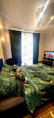 Łóżko lub łóżka w pokoju w obiekcie Wola Kasprzaka 31b