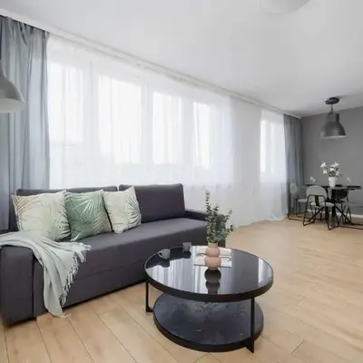 Modern and Bright Apartments with Parking Perfect for Remote Working by Noclegi Renters