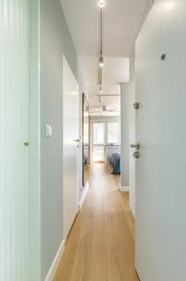 Łóżko lub łóżka w pokoju w obiekcie WLR Apartments - Chmielna II