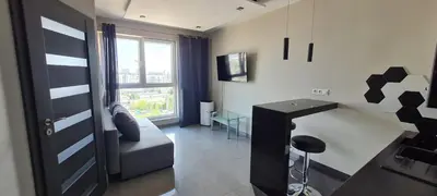 Telewizja i/lub zestaw kina domowego w obiekcie City Stay Apartament