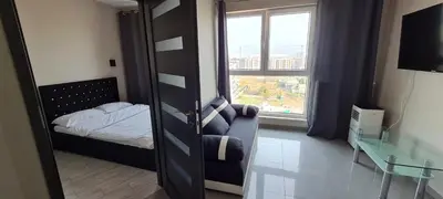Łóżko lub łóżka w pokoju w obiekcie City Stay Apartament