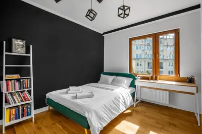 Łóżko lub łóżka w pokoju w obiekcie Plac Politechniki Deluxe Apartment by BookingHost