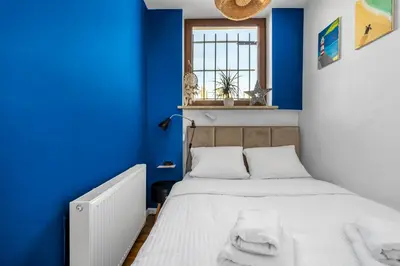 Łóżko lub łóżka w pokoju w obiekcie Plac Politechniki Deluxe Apartment by BookingHost