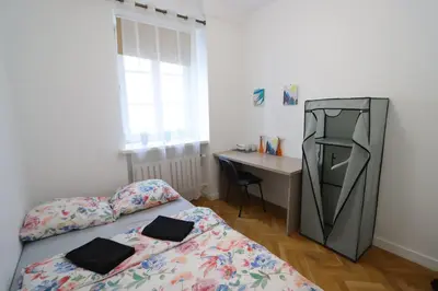 Łóżko lub łóżka w pokoju w obiekcie Fantastic-Inn Warszawa - KP69