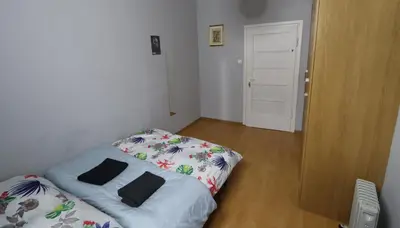 Łóżko lub łóżka w pokoju w obiekcie Fantastic-Inn Warszawa - KP69