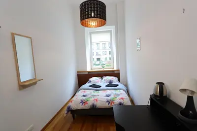 Łóżko lub łóżka w pokoju w obiekcie Fantastic-Inn Warszawa - KP69