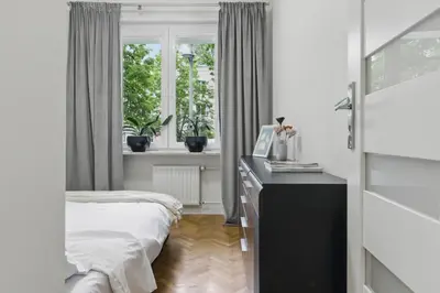 Łóżko lub łóżka w pokoju w obiekcie Paryska Bright & Cozy Stay by Solarento