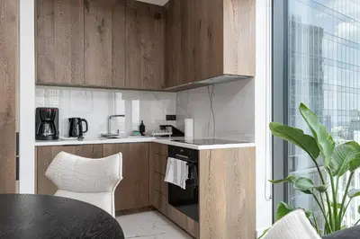 Kuchnia lub aneks kuchenny w obiekcie RentPlanet - Towarowa Towers