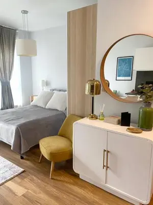 Łóżko lub łóżka w pokoju w obiekcie Living Point Mokotów