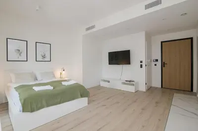 Łóżko lub łóżka w pokoju w obiekcie ShortStayPoland Prosta B187