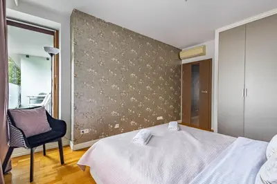 Łóżko lub łóżka w pokoju w obiekcie Apartament Leszczyńska, Powiśle