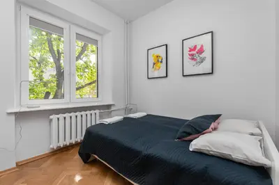 Łóżko lub łóżka w pokoju w obiekcie Aleja Szucha 11 by Homeprime