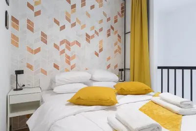 Łóżko lub łóżka w pokoju w obiekcie P&O Apartments Olbrachta
