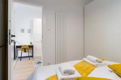 Łóżko lub łóżka w pokoju w obiekcie P&O Apartments Olbrachta