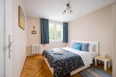 Łóżko lub łóżka w pokoju w obiekcie Wola Anielewicza Cosy Apartment by BookingHost