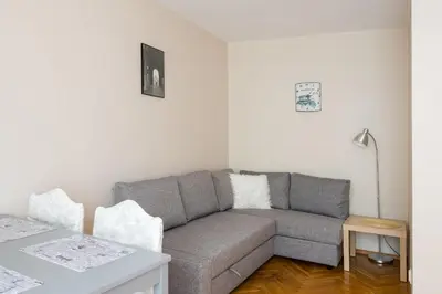 Część wypoczynkowa w obiekcie Wola Anielewicza Cosy Apartment by BookingHost