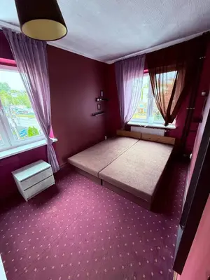 Łóżko lub łóżka w pokoju w obiekcie Team Hostel