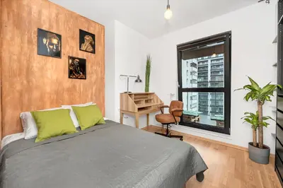 Łóżko lub łóżka w pokoju w obiekcie Lumina comfortable apartment with balcony