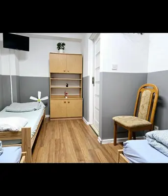 Łóżko lub łóżka w pokoju w obiekcie Rent Warszawa Ursynów