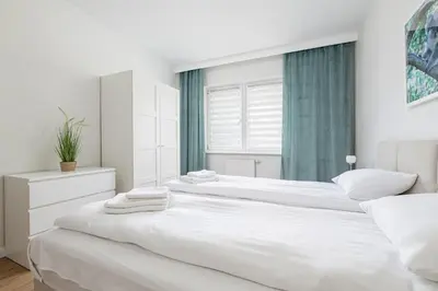 Łóżko lub łóżka w pokoju w obiekcie RentPlanet - Apartament Ulrychów