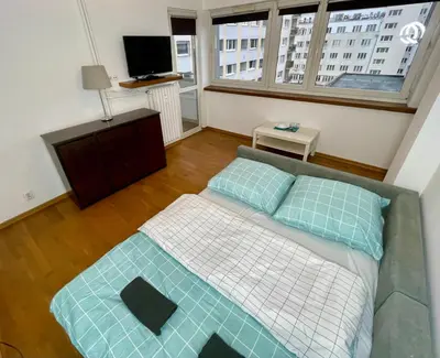 Łóżko lub łóżka w pokoju w obiekcie Fantastic-Inn Warszawa - Zgoda