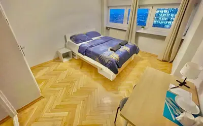 Łóżko lub łóżka w pokoju w obiekcie Fantastic-Inn Warszawa - Zgoda