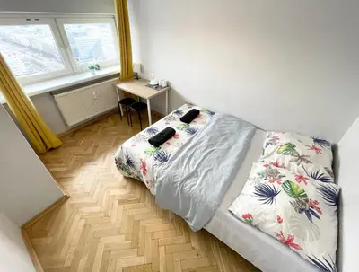 Łóżko lub łóżka w pokoju w obiekcie Fantastic-Inn Warszawa - Zgoda