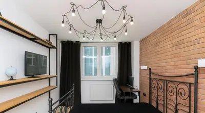 Telewizja i/lub zestaw kina domowego w obiekcie Gold Apartament
