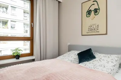 Łóżko lub łóżka w pokoju w obiekcie Mint Premium Apartment With AC City Center