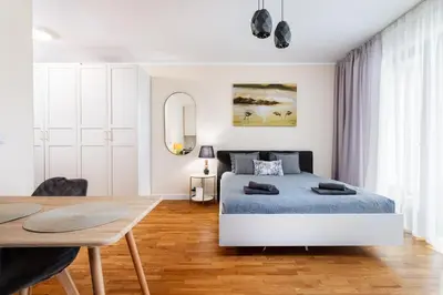 Łóżko lub łóżka w pokoju w obiekcie Business Suites Arkadia by VAYA STAYS