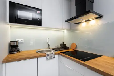 Kuchnia lub aneks kuchenny w obiekcie Business Suites Arkadia by VAYA STAYS