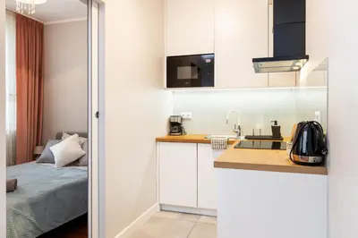 Kuchnia lub aneks kuchenny w obiekcie Business Suites Arkadia by VAYA STAYS
