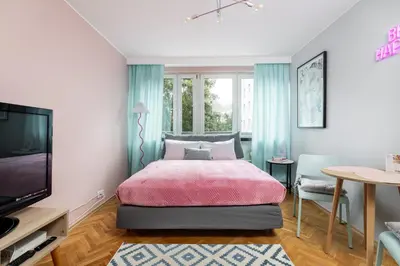 Telewizja i/lub zestaw kina domowego w obiekcie Blue Lagoon Apartment City Center