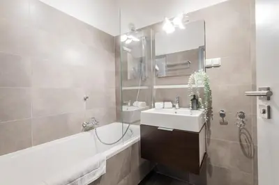 Łazienka w obiekcie Caramel Premium Apartment City Center