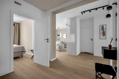 Łóżko lub łóżka w pokoju w obiekcie Ochota Three-Bedroom Apartment - 79m2, Parking, Balcony - by Rentujemy