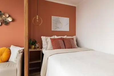 Łóżko lub łóżka w pokoju w obiekcie Marzipan Premium Apartment City Center